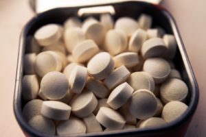 round white medicine pill in bowl