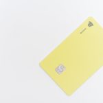 yellow square card on white surface