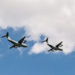 two white planes flying