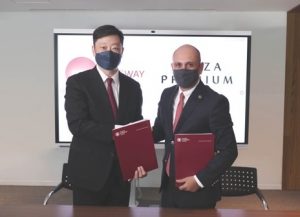 Photo captions: (l-r) Chairman & Chief Executive Officer of SATS HK Ltd, Ir Ben Wong and Deputy CEO of Plaza  Premium Group, Bora Isbulan at the signing event