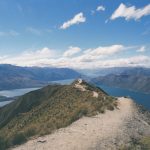 photography of mountain near body of water