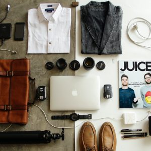 Brown Leather Bag, Clothes, and Macbook