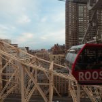 red and black train on rail tracks during daytime