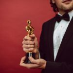 An Actor Holding His Award