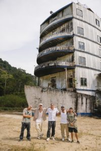 Group photo of Team Farang members Anan Anwar, Jason Paul, Dominic Di Tomasso, Joe Scandrett and Montree "Spinboy" Bouwdok in front of the abandoned ship in Koh Chang (Thailand) on January 24, 2023. // Sean Chen / Red Bull Content Pool // SI202304040030 // Usage for editorial use only //