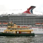 Carnival Cruise Lines vessel Carnival Spirit and Harbour City Ferries ferry Fishburn overseas terminal, Circular Quay, Sydney, N.S.W., Australia.