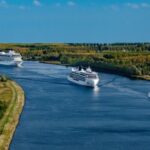 Viking Longship Mani, Expeditions ship Viking Polaris and Viking ocean ship Venus on the North Sea Canal, Amsterdam, Netherlands.