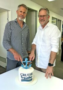 Cutting the cake are Cruise Traveller Managing Director Joseph O’Sullivan, left, and right, Director, Donal O’Sullivan.