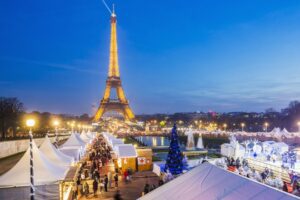 The Christmas Village at the Trocadero (one of the largest Christmas markets), on the background the Eiffel, Paris, France.
