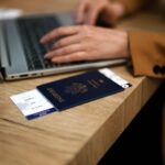 Woman with USA passport is waiting for her flight.