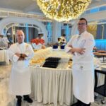 Chef Eric Barale (left) and Chef Alexis Quaretti During Brunch Service in The Grand Dining Room on board Oceania Cruises’ newest ship, Vista