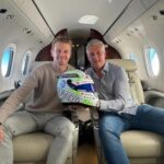 Nico Hülkenberg and Daniel Rudas on board a Hahnair business jet.