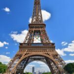 Paris, France. The Eiffel Tower adorned with the Olympic symbol, as seen from the pedestrian zone on the Iéna Bridge. June 9, 2024.