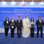 HKSAR's Chief Executive John Lee (third left) witnesses exchange of agreements reached between government departments, enterprises, and institutions from Hong Kong, Mainland China and Kuwait.