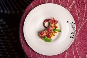 Octopus - hummus - Pomegranate condiment - zaatar spices