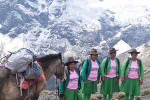 Women Porters with Packhorse on the Trail- Empowering Women at Alpaca Expeditions