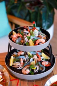 Lay Beach Club channels Mediterranean spirit with a menu of fresh, seasonal plates and bold, coastal flavours