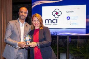 Ajay Bhojwani, Regional Managing Director, Middle East & Africa, MCI Group, received the award on behalf of MCI Australia, pictured here with IAPCO President Sissi Lignou.