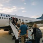 Americans Fly Out in Droves as US Inbound Travel Softens