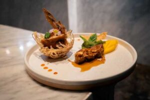 Sheraton Grande Sukhumvit basil & Blue Elephant CharityDinner_13 Nov 2025_FOOD PHOTO_Phetchabun Tamarind & French Landes Foi Gras & Chicken Wing_by Master Chef Nooror
