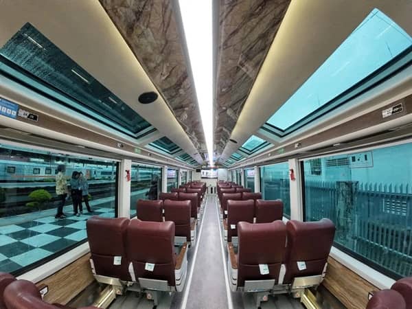 A special passenger train featuring oversized windows and often a large glass roof (sunroof) to provide unobstructed, wide-angle views of the passing scenery, turning the journey itself into a scenic experience.
