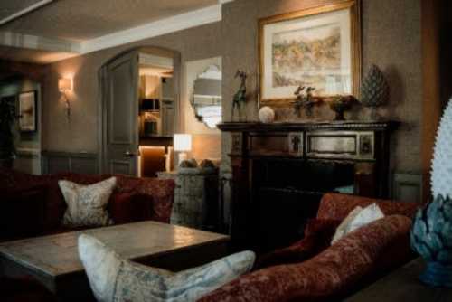 The Marcliffe’s drawing room with framed art, classic furniture and generous seating for relaxed conversation. Credit Marcliffe Hotel & Spa Scott Arlow