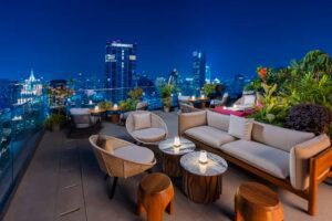 MOXI Hotel - Sato San rooftop bar - The Pier side sofa Night