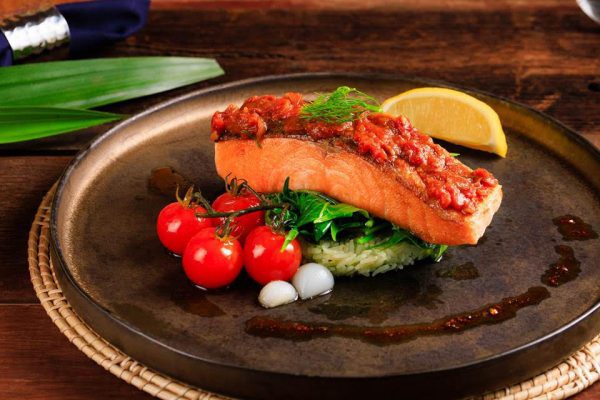 Baked salmon fillet with nham prik oung relish and pandan rice.