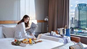 Breakfast in bed, with Bangkok serving the view.