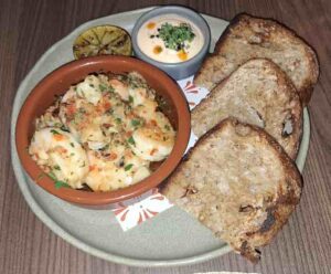 Madura’s garlic prawns bring fire, flavour and crunch