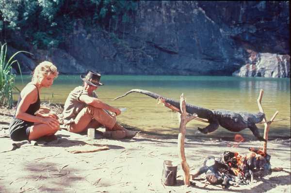 Mick Dundee and Sue Charlton at Echo Lake - aka Gunlom Falls - with roasted goanna