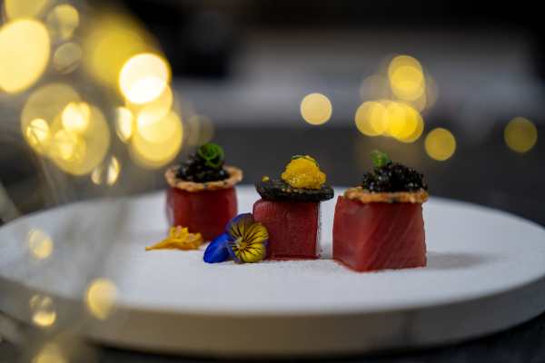 4. New Years - Bluefin Tuna Crudo with Oscietre Caviar & Gold Caviar with finger limes, shiso oil and a sesame crisp