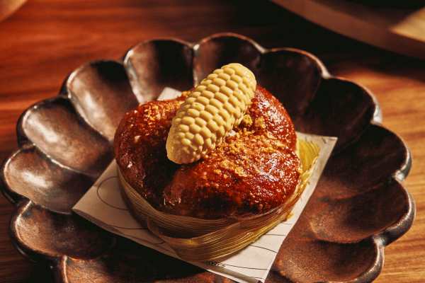 Amé menu_ Kombu brioche, corn, miso butter photographed by Ethan Smart